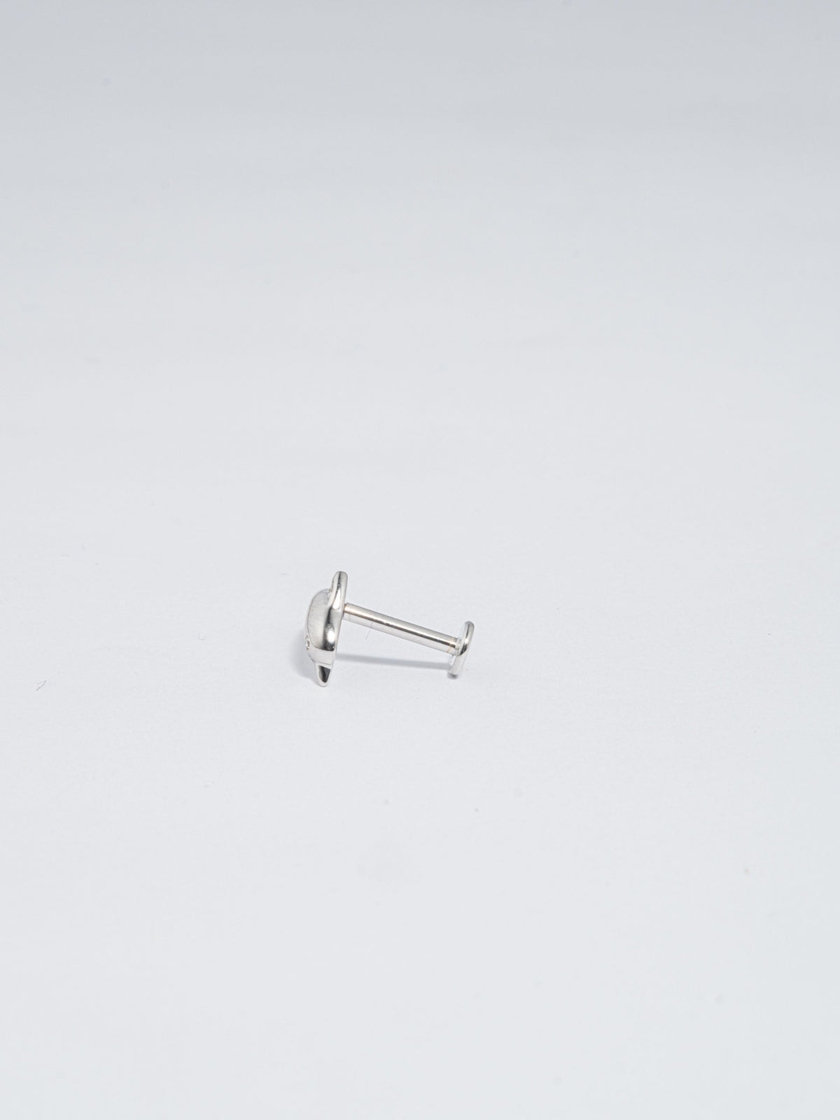 Piercing Delfín Plateado Zircón