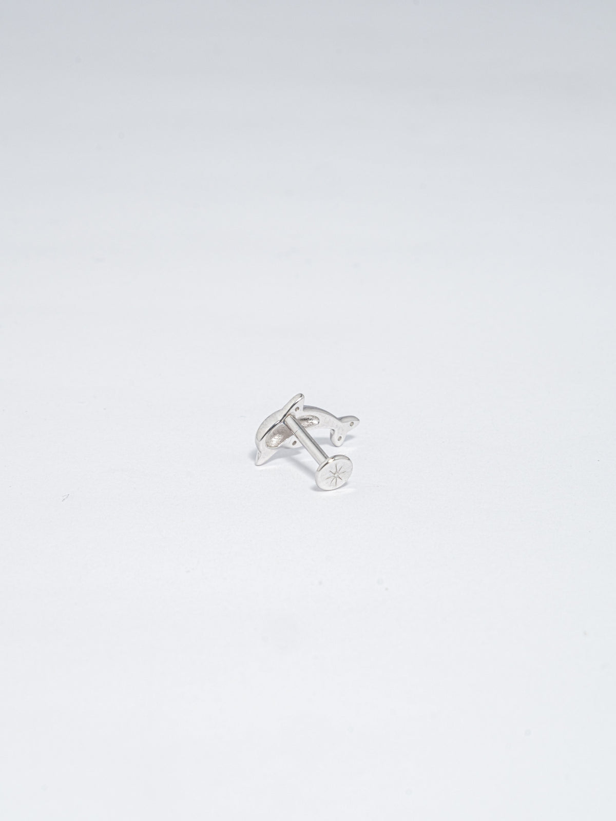 Piercing Delfín Plateado Zircón